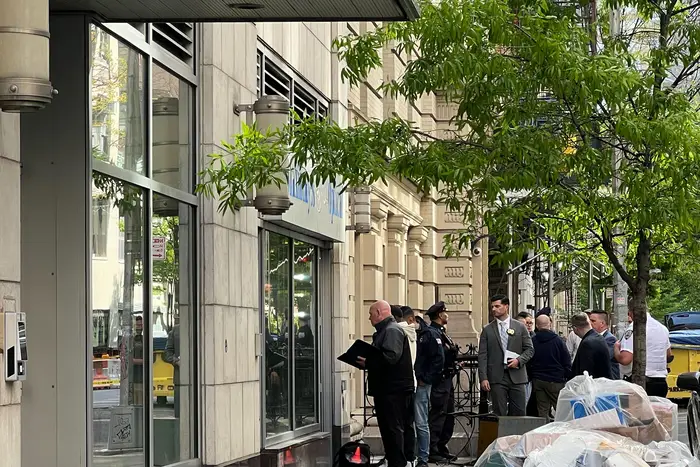 NYPD detectives investigate a shooting in Chelsea where police officials say officers shot a suspect on April 30, 2024.